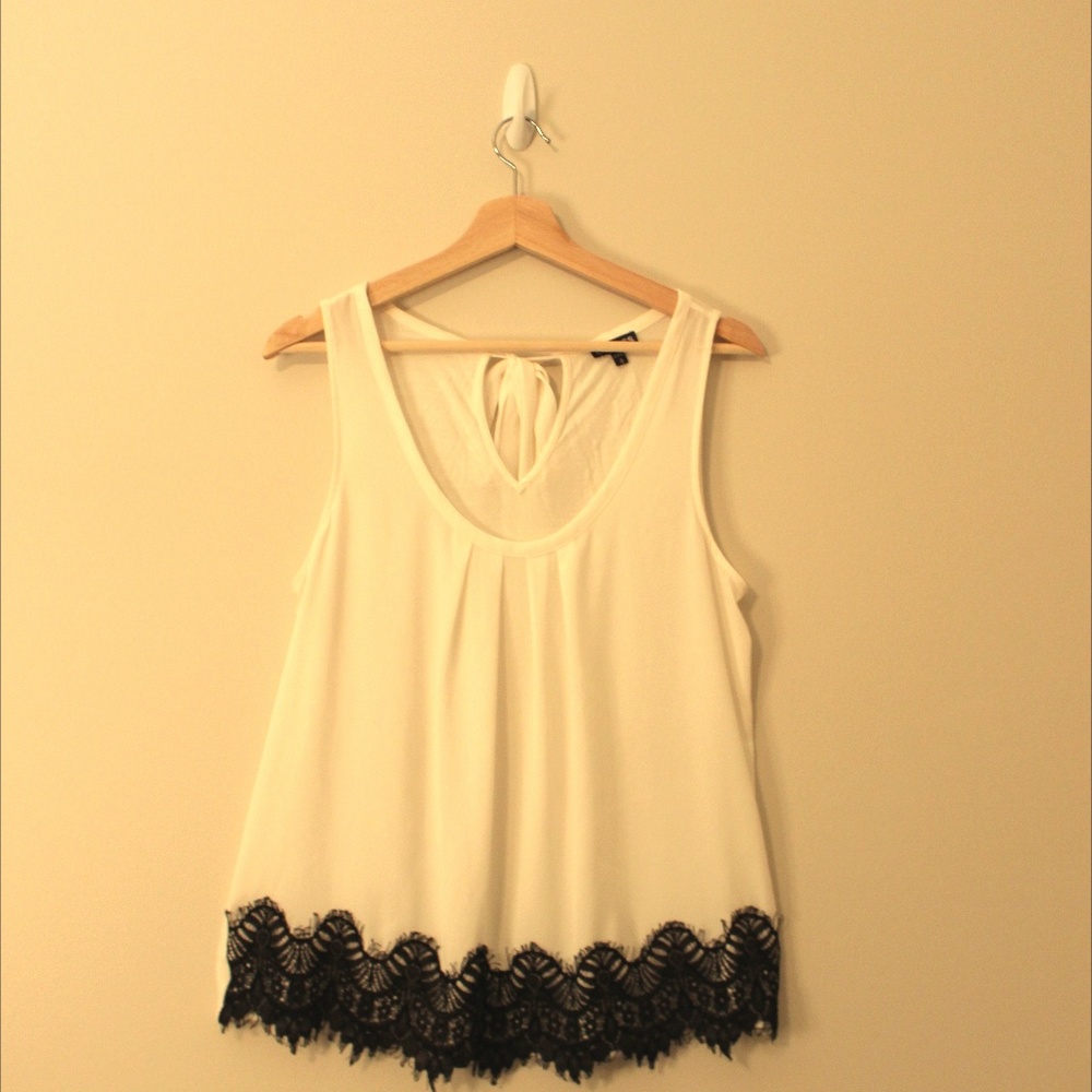 White tank top with black lace trim and bow